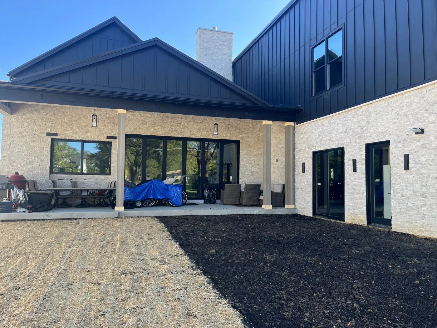 Tarping and dry-in on a Laurel Lakes commercial roof